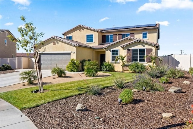 view of front of home with a front lawn, a garage, and solar panels