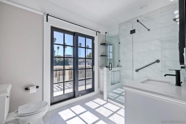 bathroom with toilet, tile patterned floors, a shower with shower door, and sink