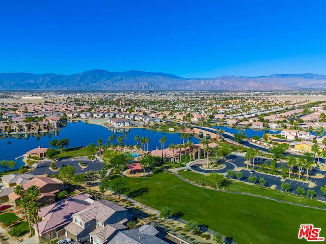 bird's eye view featuring a water and mountain view