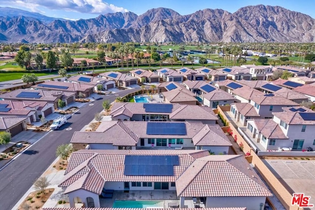 drone / aerial view featuring a mountain view