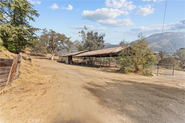 view of road featuring a mountain view and a rural view