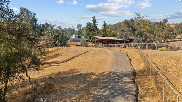 view of street featuring a rural view