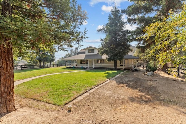 view of front of home featuring a porch and a front lawn