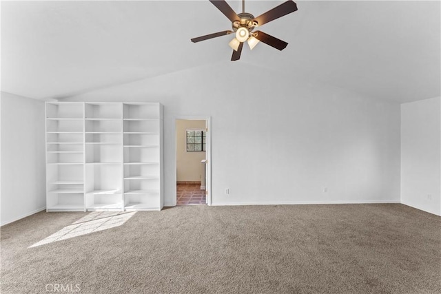 unfurnished living room with carpet, ceiling fan, and lofted ceiling