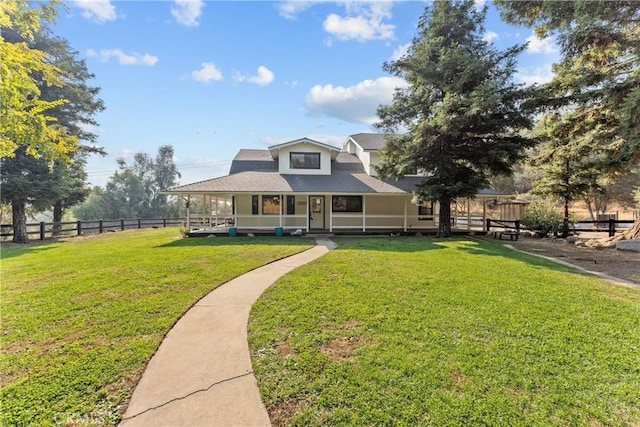 country-style home with a front yard