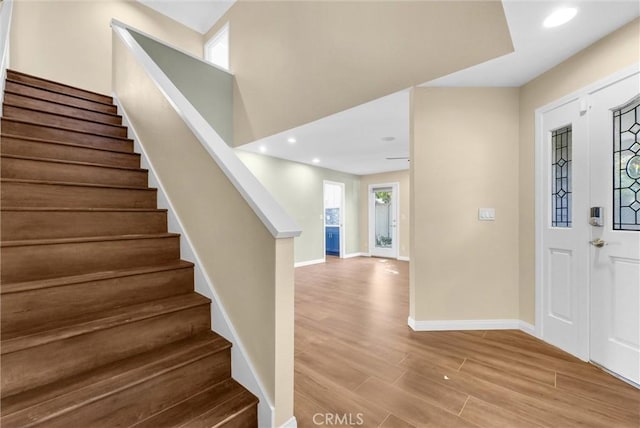 foyer with plenty of natural light and light hardwood / wood-style floors