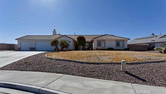 single story home with a garage