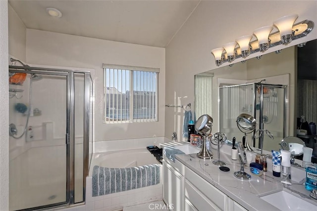 bathroom with shower with separate bathtub, lofted ceiling, and vanity