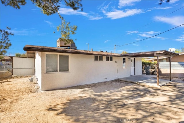 rear view of house featuring a patio area