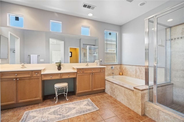 bathroom with vanity, visible vents, a stall shower, tile patterned flooring, and a garden tub