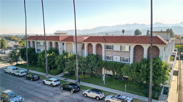 view of front of home featuring a mountain view