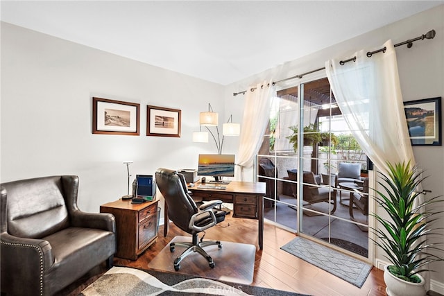 office area with wood finished floors