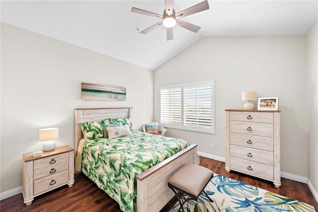 bedroom featuring baseboards, lofted ceiling, dark wood-style floors, and a ceiling fan