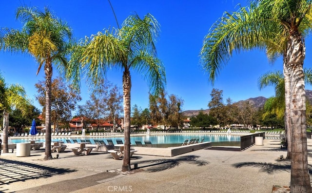 view of pool with a mountain view