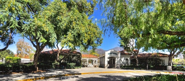 mediterranean / spanish home with a mountain view