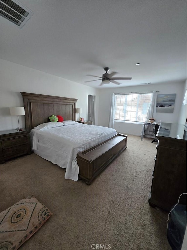 carpeted bedroom featuring ceiling fan