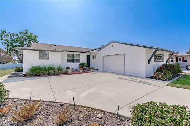 ranch-style house featuring a garage