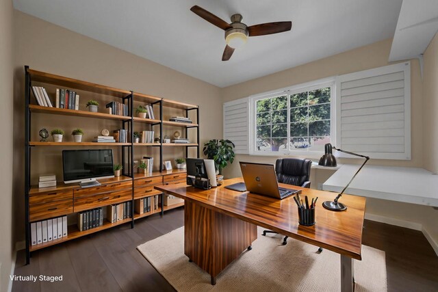 office space with ceiling fan and dark wood-type flooring