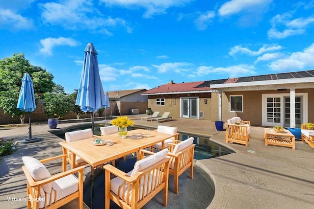 view of patio / terrace featuring french doors