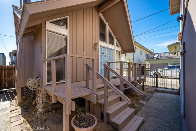 property entrance featuring a deck