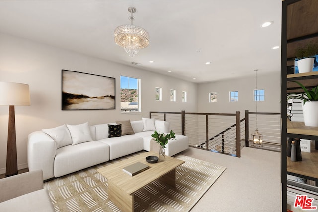 living room with a notable chandelier