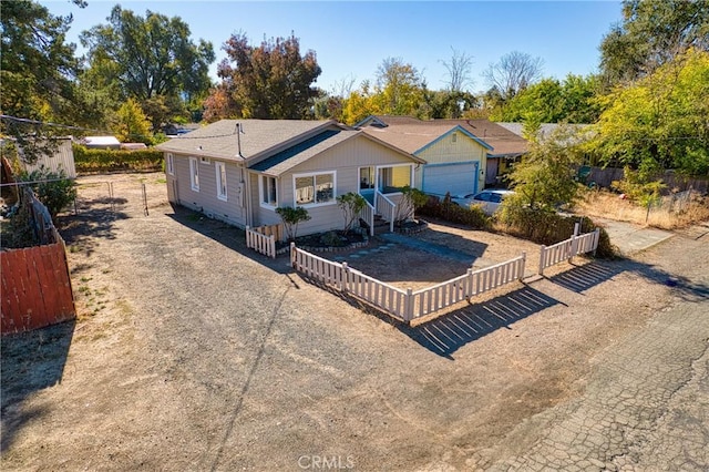 single story home with a garage