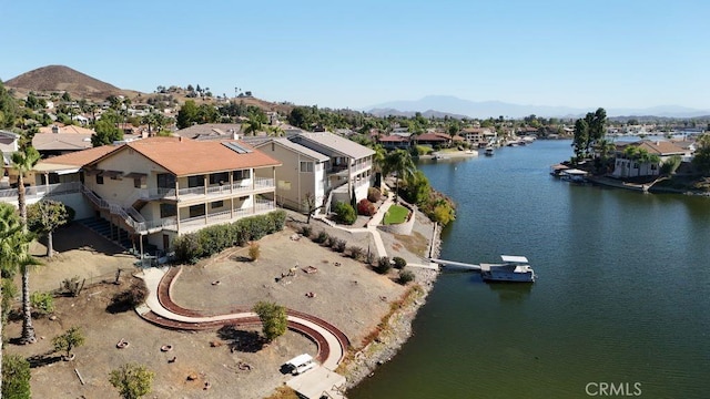 bird's eye view with a residential view and a water and mountain view