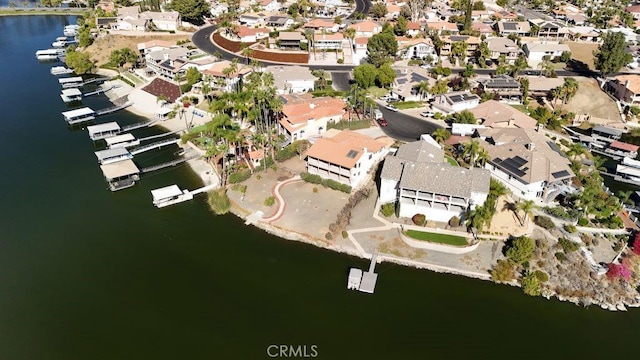 aerial view featuring a water view and a residential view