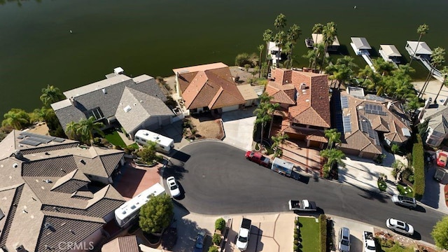 birds eye view of property with a residential view