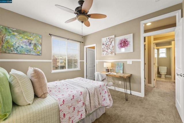 bedroom featuring light carpet and ceiling fan