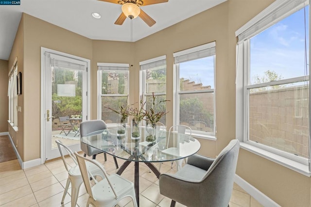 sunroom / solarium with ceiling fan and plenty of natural light