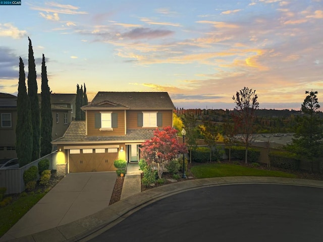 view of front of property with a garage