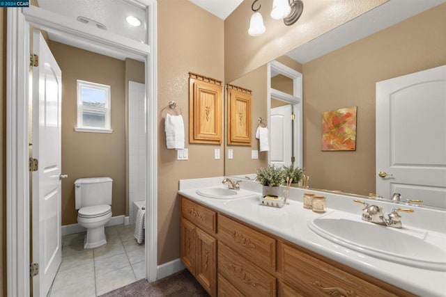 full bathroom with tile patterned floors, vanity,  shower combination, and toilet