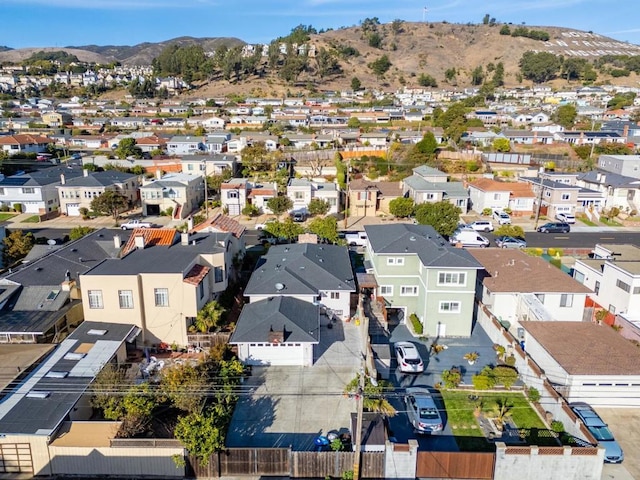 drone / aerial view featuring a mountain view