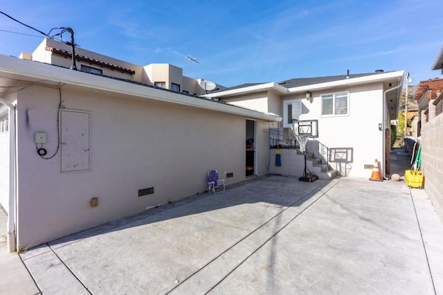 rear view of house featuring a patio area