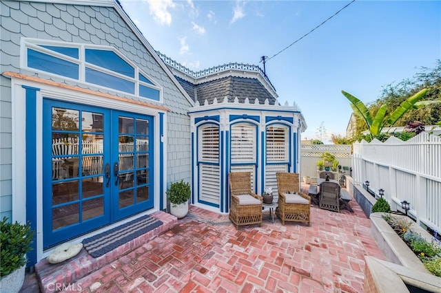 view of patio / terrace featuring a fenced backyard and french doors