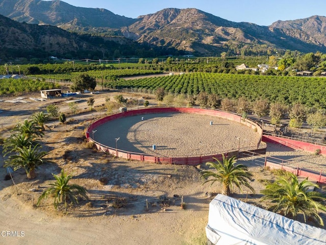 mountain view featuring a rural view