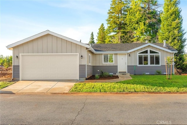 511 Montgomery, Paradise, CA 95969 - ranch-style house featuring an attached garage, a front yard, driveway, crawl space, and board and batten siding