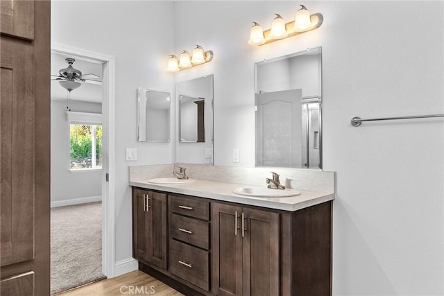 511 Montgomery, Paradise, CA 95969 - full bathroom with ceiling fan, double vanity, and wood finished floors