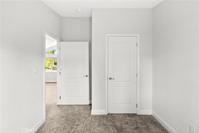 unfurnished bedroom featuring carpet