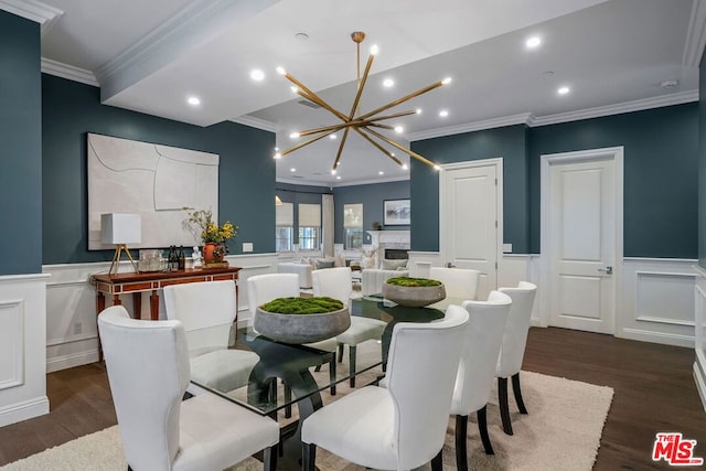 dining room with a chandelier, crown molding, and dark wood-type flooring