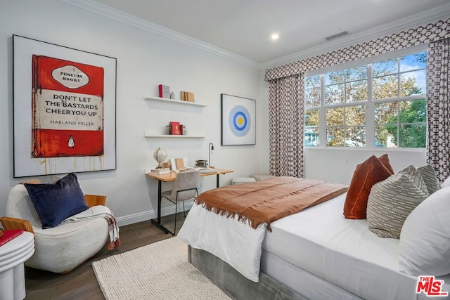 bedroom with crown molding and dark wood-type flooring