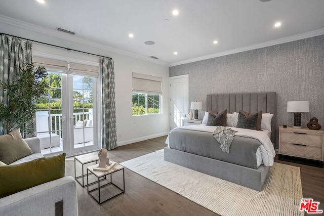 bedroom featuring access to exterior, dark hardwood / wood-style floors, and ornamental molding