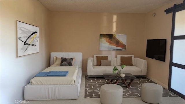 bedroom featuring baseboards