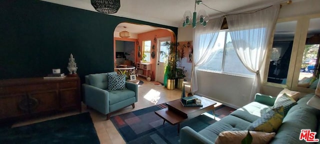 living room with a chandelier and hardwood / wood-style flooring