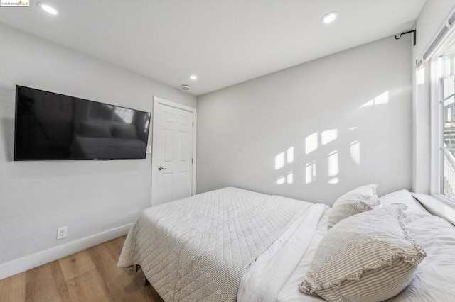 bedroom featuring hardwood / wood-style floors