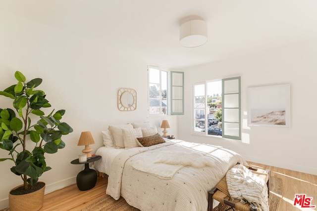 bedroom featuring hardwood / wood-style flooring