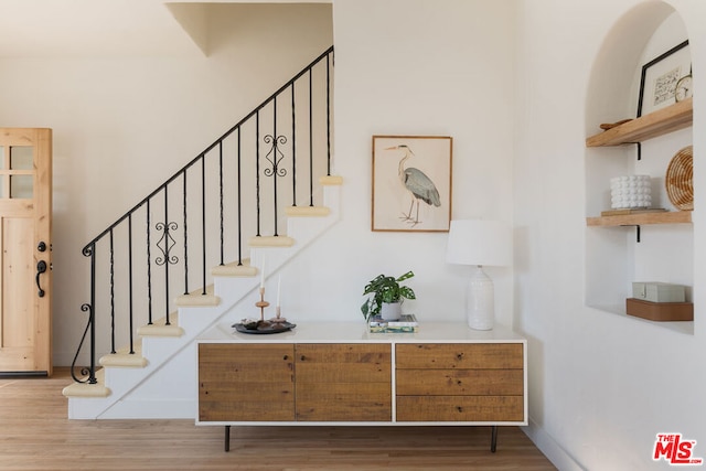 interior space with hardwood / wood-style flooring