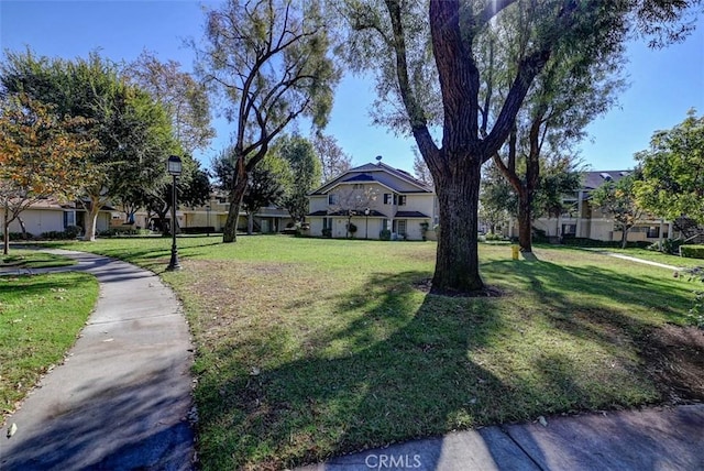 exterior space with a front lawn