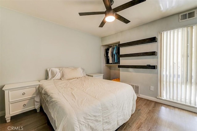 bedroom featuring ceiling fan and hardwood / wood-style floors